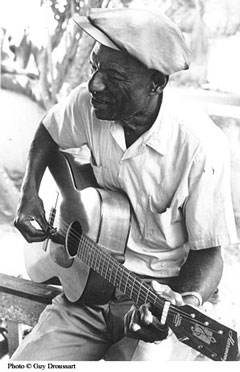 Joseph Spence playing guitar